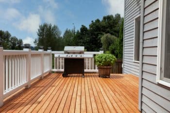 Outdoor,Home,Deck,With,Bbq,Cooker,And,Basil,Herbs